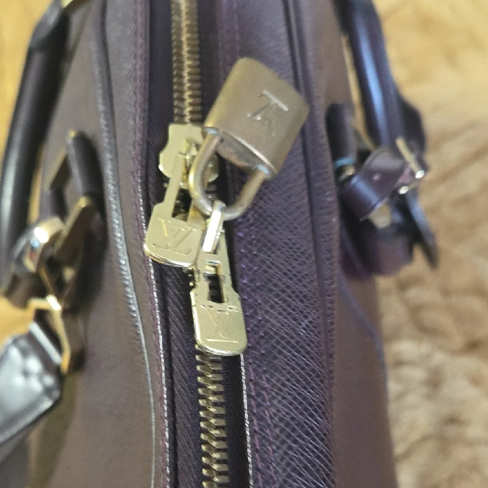 Louis Vuitton Helanga Taiga Luggage with garment bag